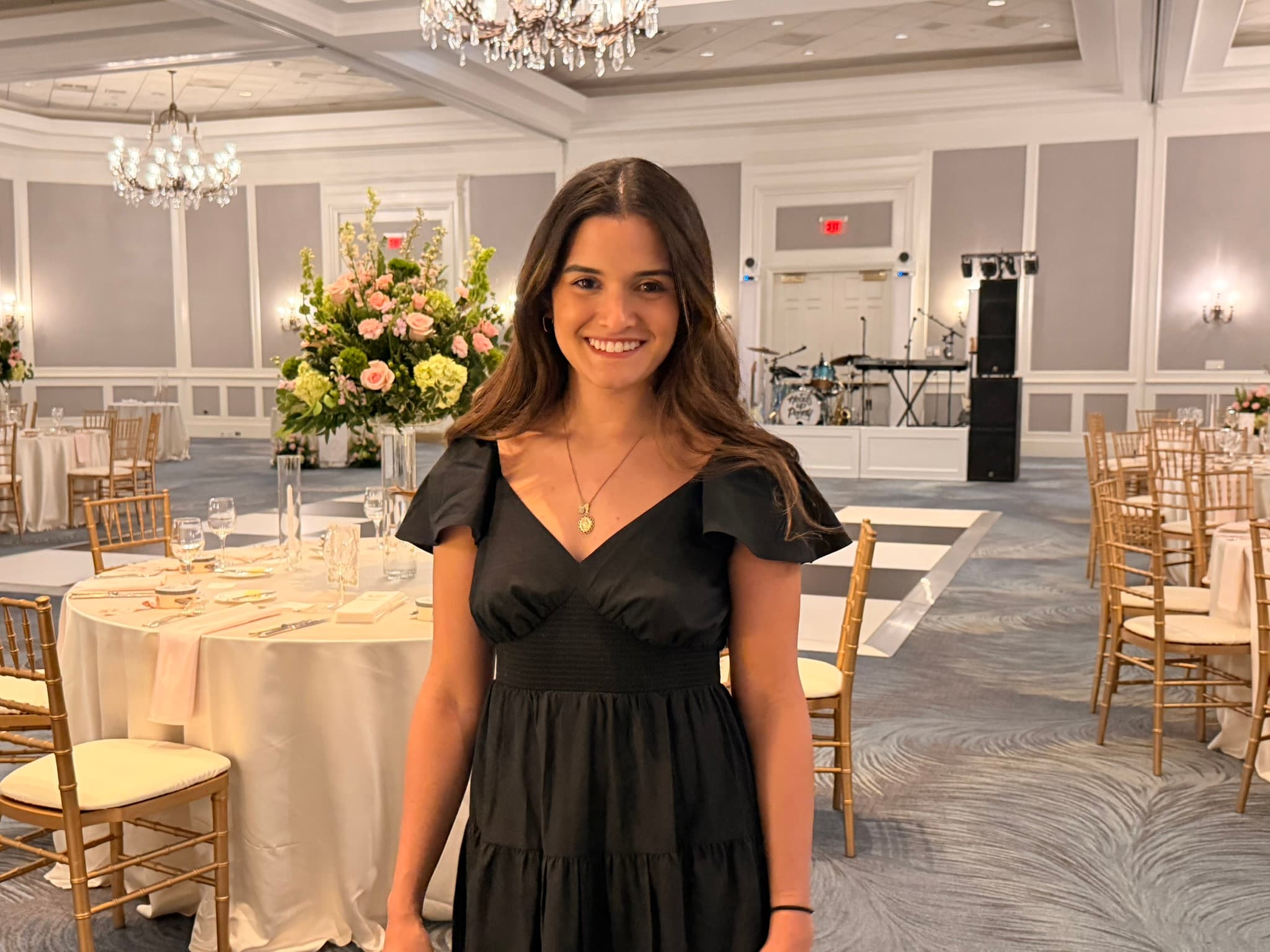 Miriam painting at a wedding